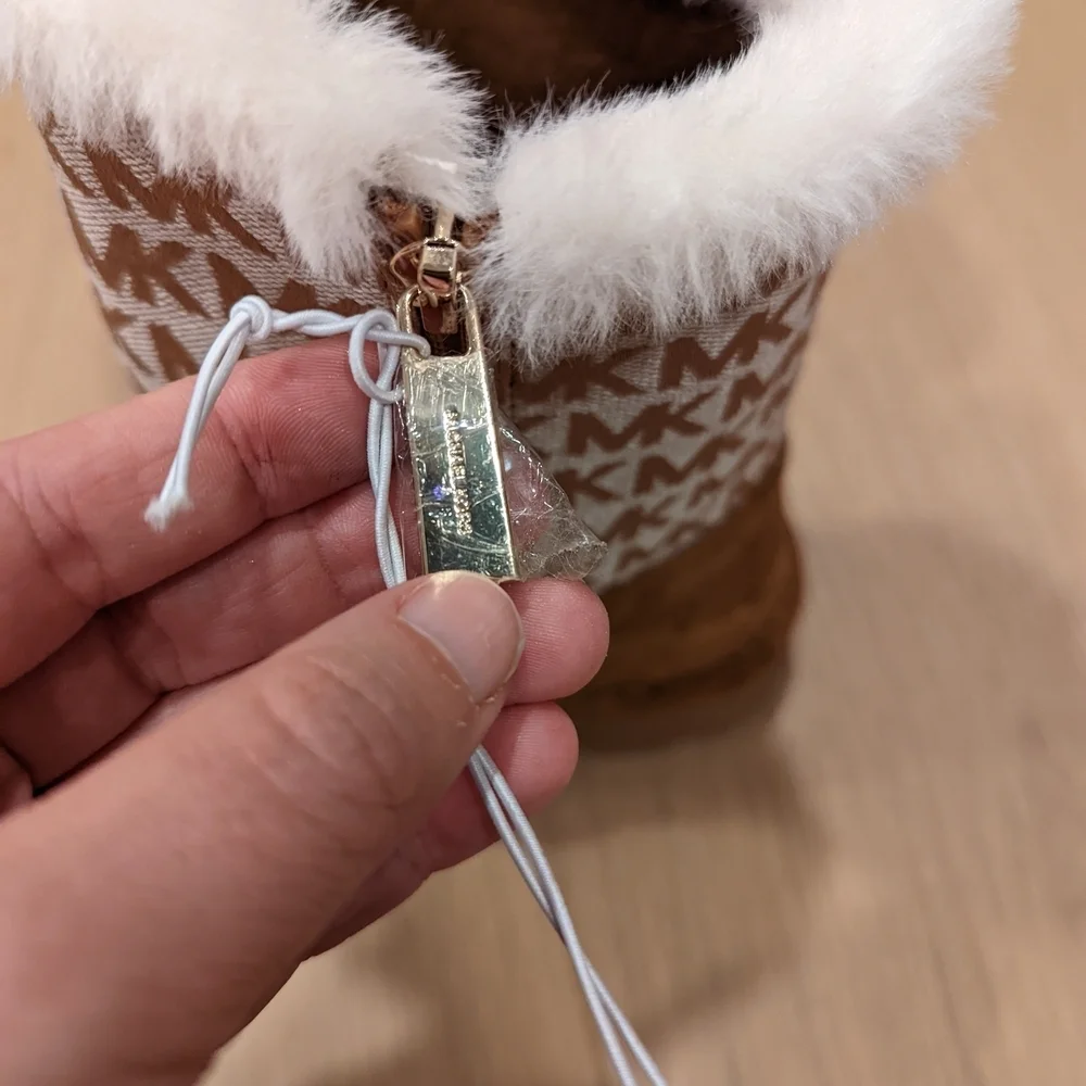Michael Kors Brown and White Fur Boots